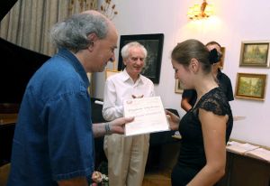 Anastasiia Shanskova receives diploma; Music and Literature Club 30. Aug 2012.